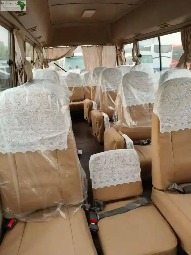Location DE BUS Toyota Coaster - Vue 3